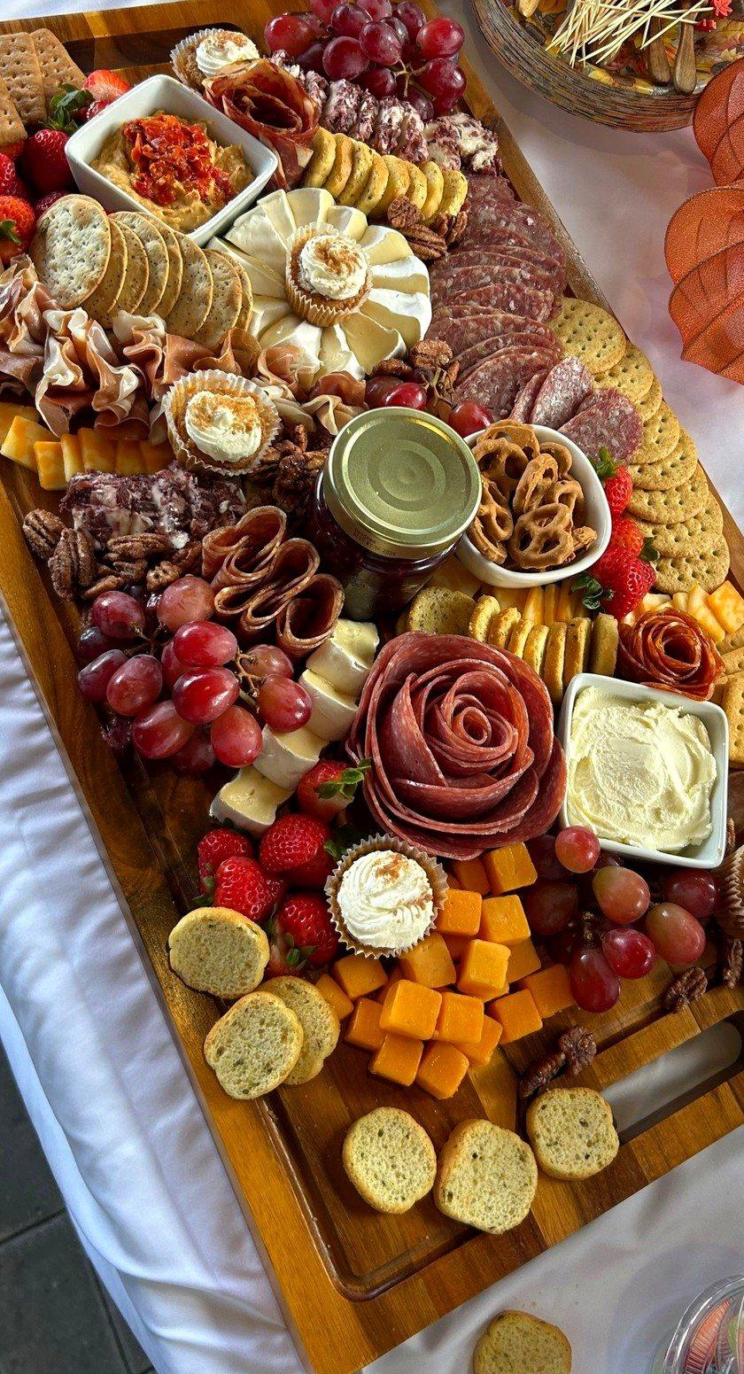 The Gathering Board: real Aura Gourmet board with salami roses, cured meats, cheeses, dips, crackers and fresh fruit
